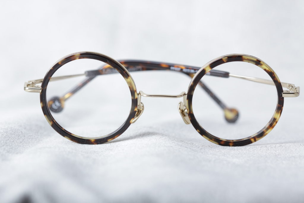 Round vintage style plastic and metal eyeglass frame